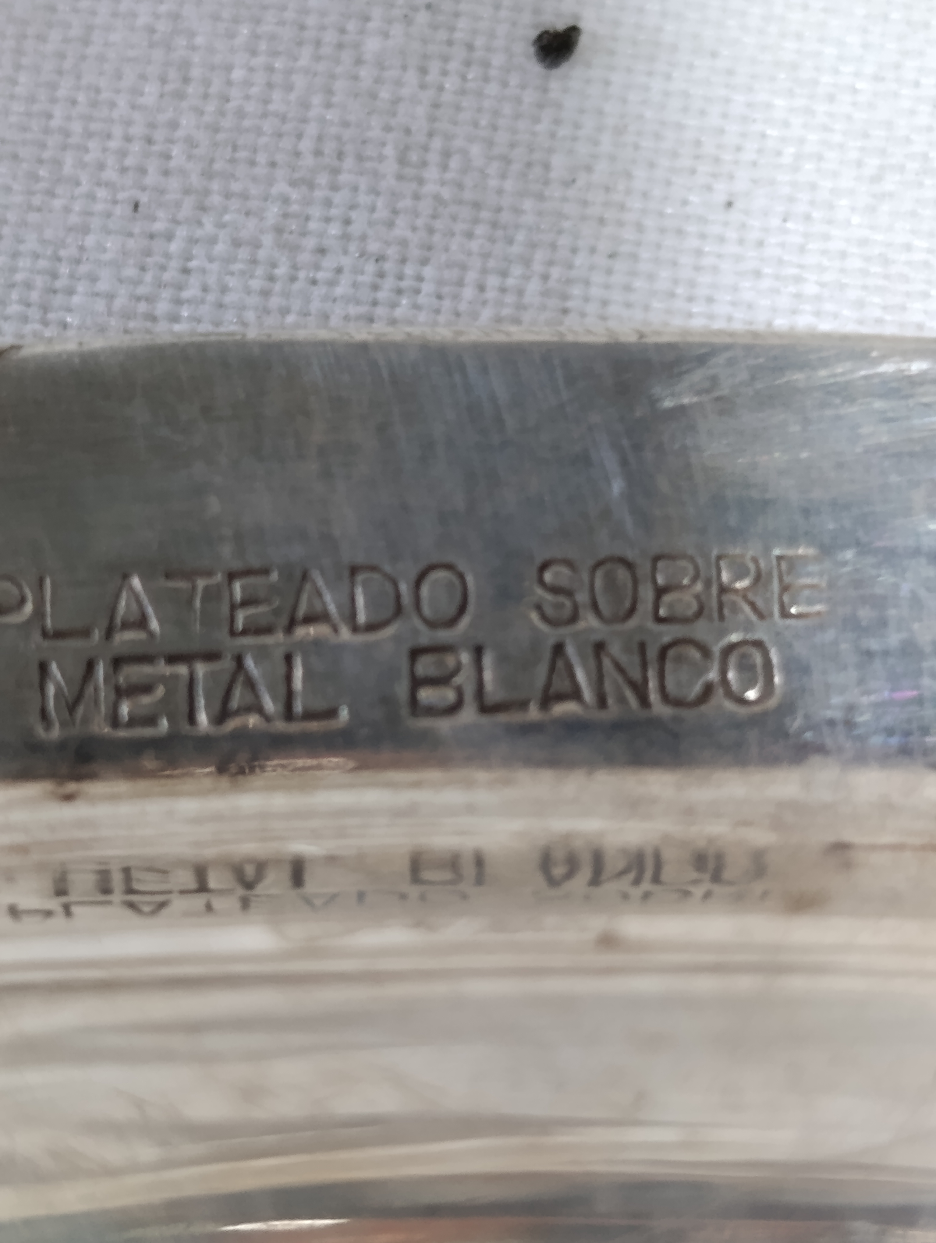 Plato medal blanco con baño de plata